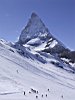 Skiers stop to pay homage to the Matterhorn